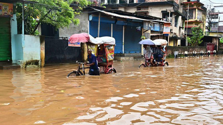 hindistanda sel ve heyelanlar 18 kisinin olumune yol acti 4rsMPxlt